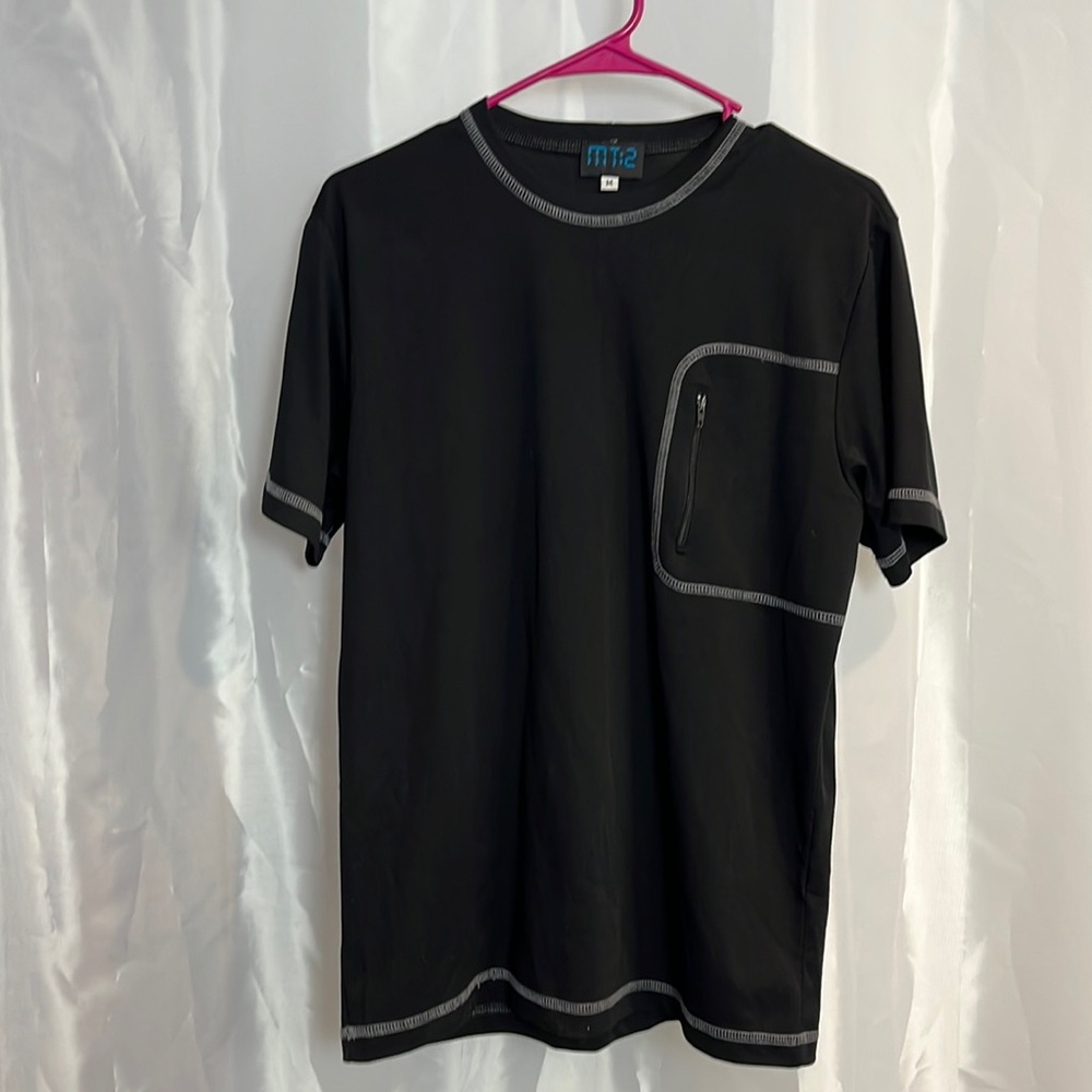 Men’s short sleeve top.  1986